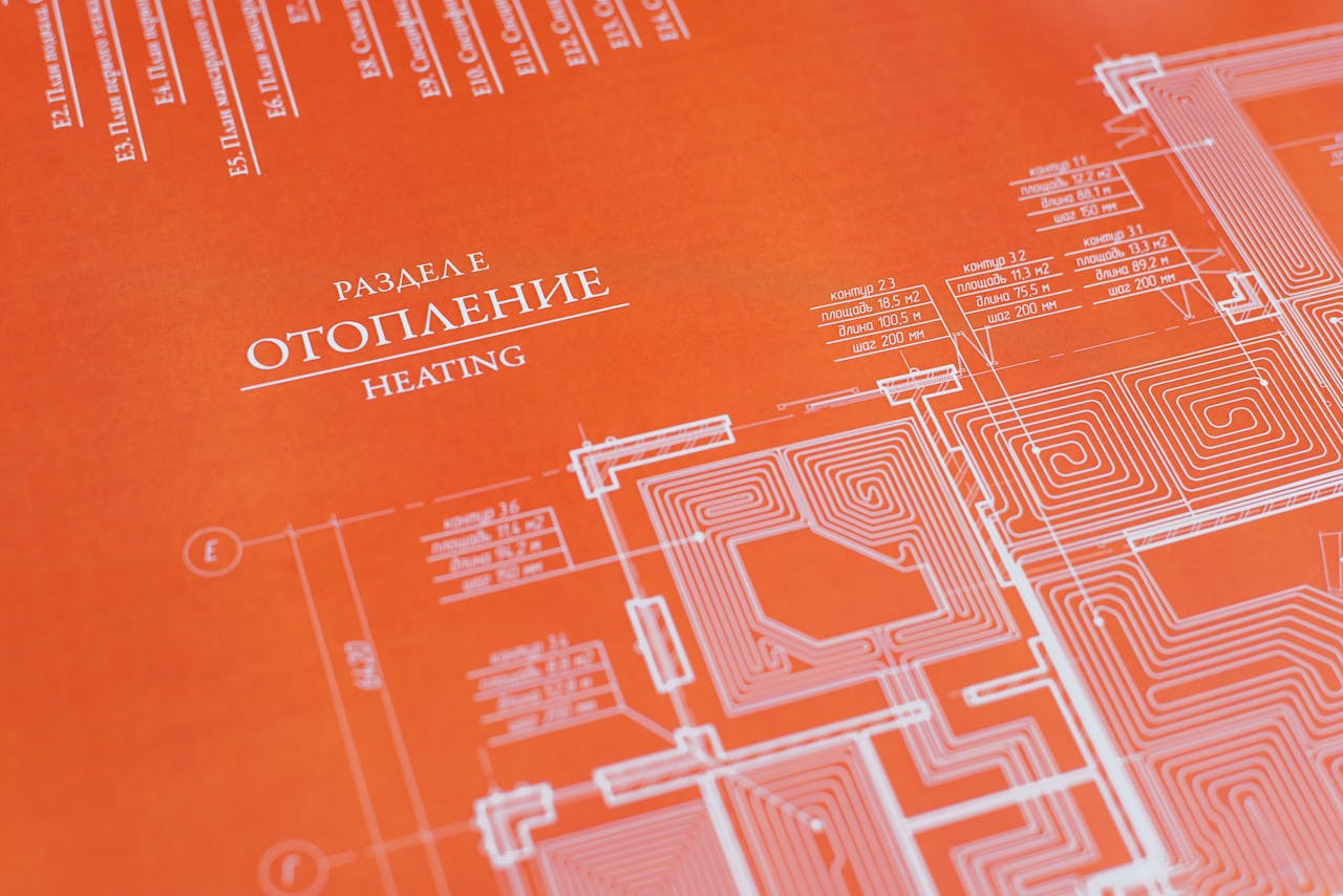 digital Orange background blueprint showcasing a detailed heating system design plan.